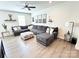 Comfortable living room with plush sectional sofa and modern decor, creating a cozy and inviting space at 2315 Doby Creek Ln # 77, Charlotte, NC 28262