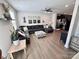 Open-concept living space with a large sectional sofa, view into the kitchen, and sleek modern furnishings at 2315 Doby Creek Ln # 77, Charlotte, NC 28262