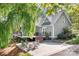 A backyard area features an outdoor patio and seating area with a fire pit at 234 Winding Shore Rd, Troutman, NC 28166