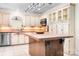 Well-equipped kitchen featuring an island, stainless steel appliances, and ample cabinet space at 234 Winding Shore Rd, Troutman, NC 28166