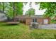 Large backyard with trampoline and patio seating at 2429 Sugar Mill Rd, Charlotte, NC 28210