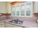 This kitchen features a stainless steel sink, stainless steel dishwasher, and lots of natural light at 2429 Sugar Mill Rd, Charlotte, NC 28210