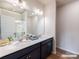 Bathroom featuring a double sink vanity with white countertops and modern fixtures at 2555 Ruby Dixon Crossing Dr # 16, Gastonia, NC 28056