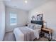 Well-lit bedroom featuring neutral decor, carpeting, and window at 2555 Ruby Dixon Crossing Dr # 16, Gastonia, NC 28056