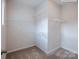Spacious walk-in closet with carpet and multiple wire shelves for optimal storage at 2555 Ruby Dixon Crossing Dr # 16, Gastonia, NC 28056