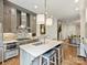 Well-appointed kitchen with a center island, stainless steel appliances, and open layout at 2616 Colton Dr, Charlotte, NC 28211