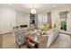 Inviting living room features a stone fireplace, stylish seating, and a neutral color palette at 2616 Colton Dr, Charlotte, NC 28211