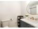 Chic bathroom featuring marble countertops, gold fixtures, and a stylish vanity at 2630 Park Rd # H, Charlotte, NC 28209