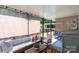 Relaxing porch showcasing comfortable seating, ideal for outdoor enjoyment and entertaining guests at 2630 Park Rd # H, Charlotte, NC 28209
