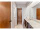 Bathroom with a vanity, a pink sink, and a doorway to a shower area at 2643 Providence Dr, Gastonia, NC 28052