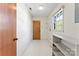 Functional laundry area featuring shelving and a practical layout at 2643 Providence Dr, Gastonia, NC 28052