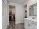 This is a modern bathroom that features double sinks with walk-in closets on either side at 2890 Westshore Pl, Denver, NC 28037