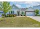 Inviting home exterior features a well-manicured lawn and appealing landscaping at 2890 Westshore Pl, Denver, NC 28037