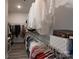 This is a walk-in closet features well-organized storage solutions for shirts and pants at 2890 Westshore Pl, Denver, NC 28037