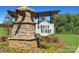 Stone entrance sign for Asbury Ridge surrounded by landscaping at 291 Bezelle Ave, York, SC 29745