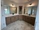 Primary bathroom featuring double sinks, quartz countertops, and ample cabinet space at 3214 Mcharney Dr # 34, Harrisburg, NC 28075