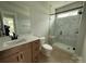 Modern bathroom with a glass-enclosed shower, sleek vanity, and stylish tile flooring at 3214 Mcharney Dr # 34, Harrisburg, NC 28075