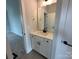 Modern bathroom with a vanity, sink, and ample storage in a well-lit space at 3214 Mcharney Dr # 34, Harrisburg, NC 28075