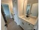 Double vanity bathroom with white quartz countertops, tile flooring, and black hardware at 3214 Mcharney Dr # 34, Harrisburg, NC 28075