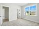 Bright bedroom with carpet, closet, window overlooking neighborhood at 3214 Mcharney Dr # 34, Harrisburg, NC 28075
