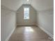 Walk-in closet featuring wire shelving and a window for natural light at 3214 Mcharney Dr # 34, Harrisburg, NC 28075