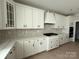 Bright kitchen featuring white cabinets, quartz countertops, and stainless steel appliances at 3214 Mcharney Dr # 34, Harrisburg, NC 28075