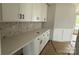 Kitchen features a countertop with modern white cabinets and backsplash at 3214 Mcharney Dr # 34, Harrisburg, NC 28075