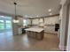 Spacious kitchen featuring a large island, stainless steel appliances, and stylish finishes at 3214 Mcharney Dr # 34, Harrisburg, NC 28075