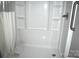 Tidy white walk-in shower with built in shelves and a hand towel at 331 Eastwood Dr, Salisbury, NC 28146