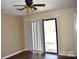 Bedroom with hardwood floors and sliding doors to the exterior at 331 Eastwood Dr, Salisbury, NC 28146