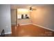 Living room featuring hardwood floors and open view to the kitchen area at 331 Eastwood Dr, Salisbury, NC 28146