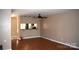 Cozy living room with hardwood floors and a view into the kitchen at 331 Eastwood Dr, Salisbury, NC 28146