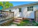 Exterior view of the backyard with a deck and access to the house at 3678 Old Camden Hwy, Heath Springs, SC 29058