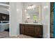 Bathroom featuring a double sink vanity, a large mirror and modern fixtures and finishes at 3678 Old Camden Hwy, Heath Springs, SC 29058