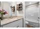 Bathroom featuring a vanity with granite countertop, cabinet, and a shower-tub combo at 3722 Windy Pine Nw Ln, Hickory, NC 28601