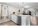 Bright kitchen features granite countertops, stainless steel appliances, and wood-look floors at 3722 Windy Pine Nw Ln, Hickory, NC 28601