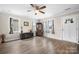 Bright living room with hardwood floors, classic trim and large windows at 3722 Windy Pine Nw Ln, Hickory, NC 28601