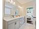 Modern bathroom with double vanity, quartz countertop, and sleek fixtures at 423 Sensibility Cir, Fort Mill, SC 29708