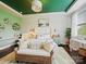 Bright bedroom with natural light, stylish decor, and cozy furnishings at 423 Sensibility Cir, Fort Mill, SC 29708