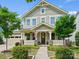 Charming two-story home with a covered porch, landscaped yard, and beautiful curb appeal in a lovely neighborhood at 423 Sensibility Cir, Fort Mill, SC 29708