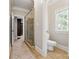 Updated bathroom featuring a glass-enclosed shower and separate toilet room for added convenience at 4525 Island Waters Dr, Denver, NC 28037