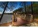 Beautiful waterfront dock featuring an entertaining area with seating and views of the lake at 4525 Island Waters Dr, Denver, NC 28037