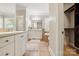 Bright main bathroom boasts double sinks, walk-in shower, soaking tub and a spacious walk-in closet at 4525 Island Waters Dr, Denver, NC 28037