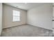 Carpeted bedroom featuring a window, creating a cozy atmosphere at 5014 Fandango Rd, York, SC 29745