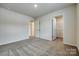 A neutral-toned bedroom shows two doorways and carpeted floors at 5014 Fandango Rd, York, SC 29745