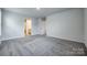 This bedroom features carpeted floors and ensuite bath at 5014 Fandango Rd, York, SC 29745