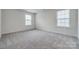 The bright bedroom features carpet floors and windows at 5014 Fandango Rd, York, SC 29745