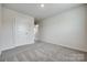 A bedroom shows a closet doorway and carpeted floors at 5014 Fandango Rd, York, SC 29745
