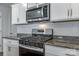 This modern kitchen features stainless steel appliances and granite countertops at 5014 Fandango Rd, York, SC 29745