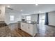The kitchen island features granite countertops and stainless steel appliances at 5014 Fandango Rd, York, SC 29745